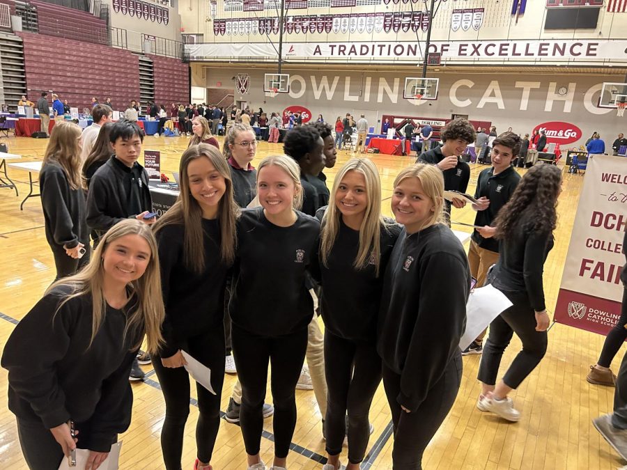Students all over Dowling Catholic High School participate in the college fair to get to know what college sounds interesting to them. [A. Langin]