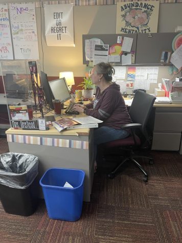 Mrs. Umstead works at her computer during one of her classes.