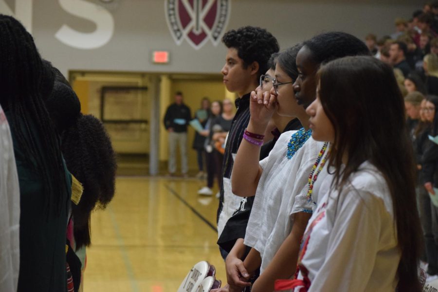 A group of Dowling students pay close attention as Father Reed Flood speaks.
From front to back: Angela Lara Calderon, Selena Germano, Melissa Aguilar Murillo, Joaquin Antezano, and Oscar Beltrand.