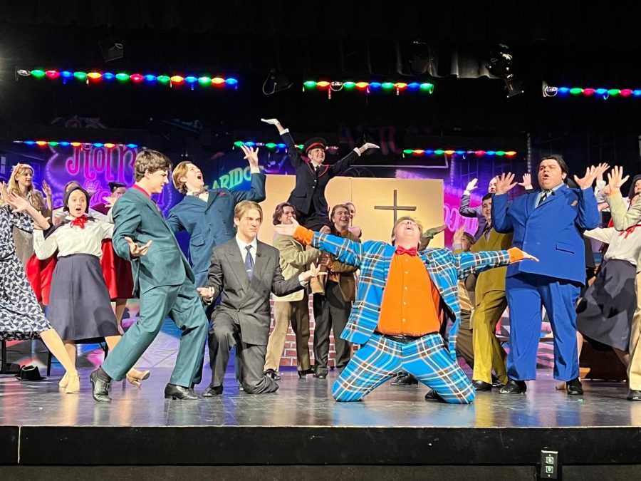 The cast of Guys and Dolls brings the show to a close in the finale.
