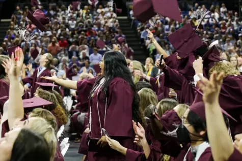 Dowling Catholic High School class of 2022 graduates celebrate at the comencement ceremony at the Knapp Center [Des Moines Register].