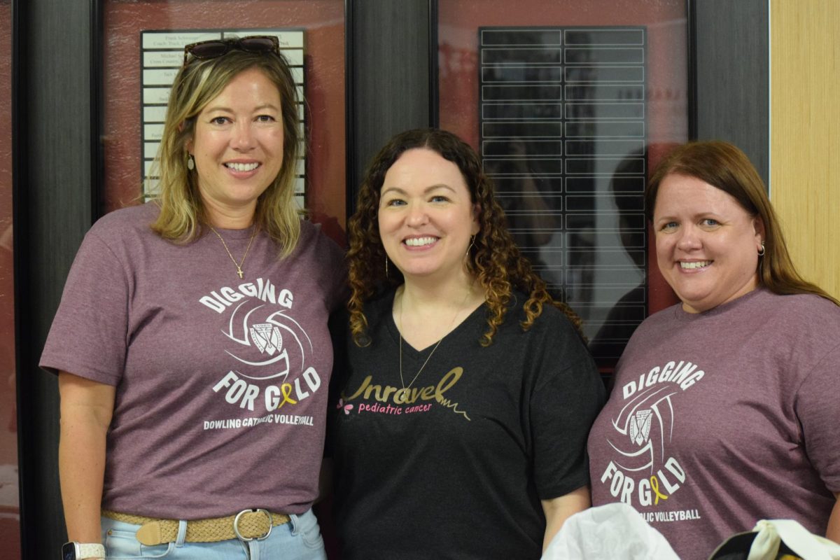 Michelle Foth, Lucy Sandeen, and Tricia Gonyo smile after organizing a successful fundraiser.
