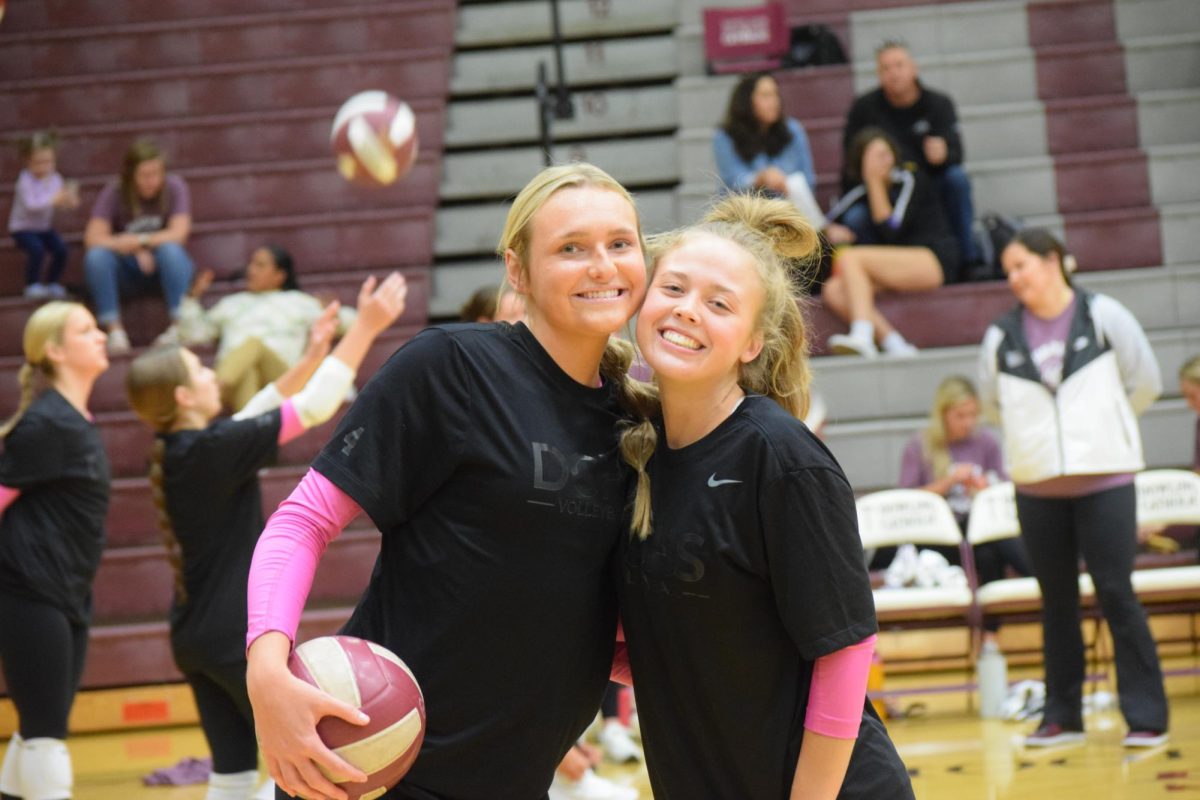 Siri Beecher and Ashley Staun smile for the camera.