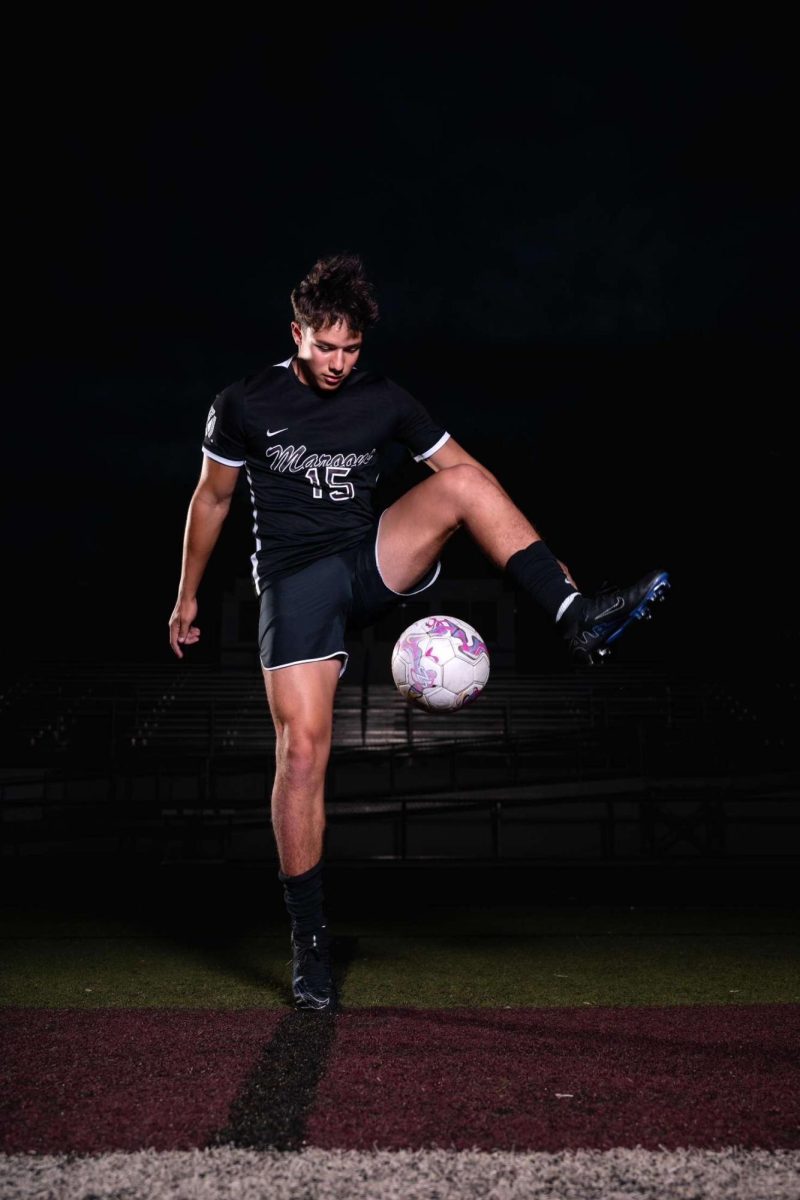 John Foth demonstrating his soccer abilities in his senior photos.
