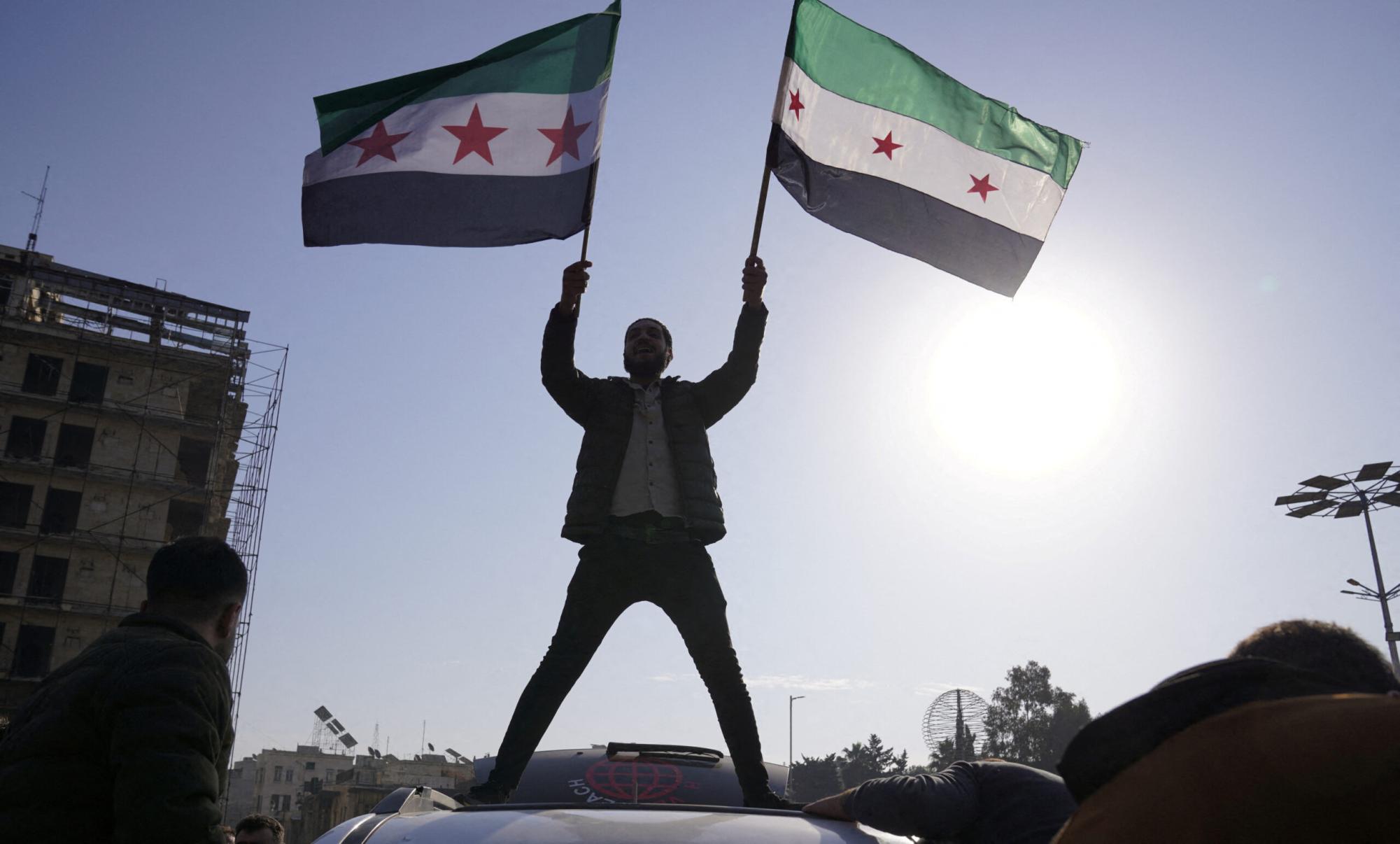 Rebels in Syria move through the country on Sunday, December 9th.