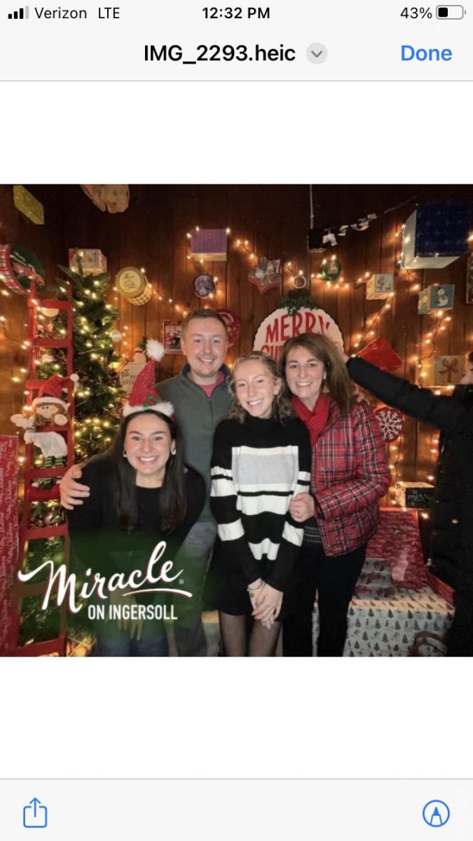 Son Mark, Mrs. Kelly, and daughters Mary and Kate enjoy the festive season. 