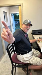 O'Grady doing what he loved best - cheering on the Maroons