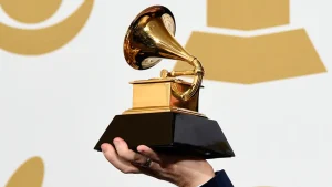 The coveted Grammy statue awaits its winners. Watch the ceremony live this Sunday.