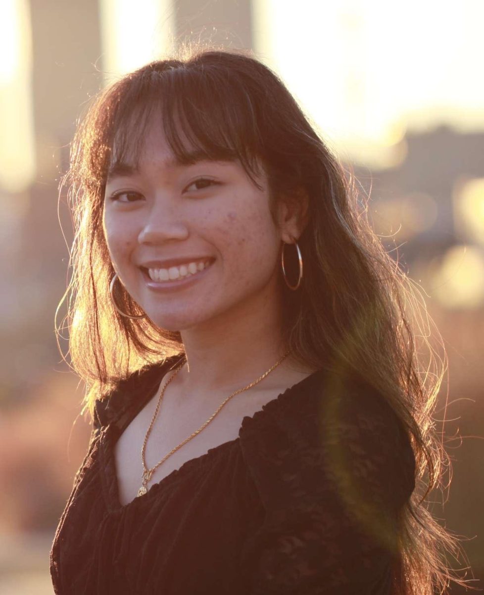 Samantha Ratsakanh enjoys the sunset in her senior pictures.