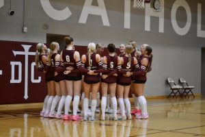 The DCHS volleyball team does their pregame hype cheer.