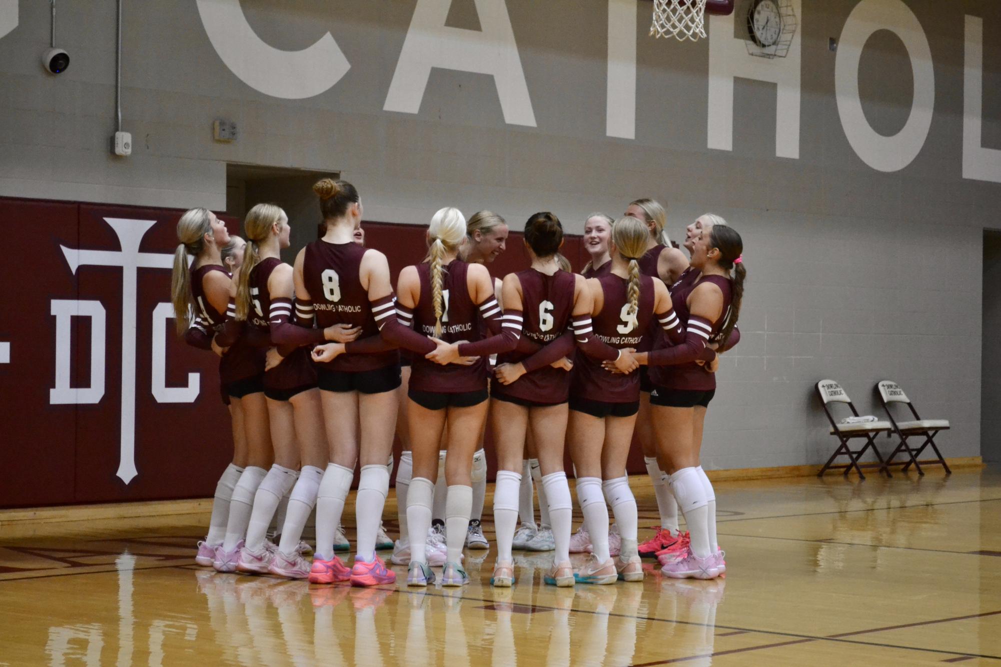 The DCHS volleyball team does their pregame hype cheer.
