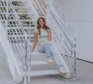 Victoria smiles for her senior photos.