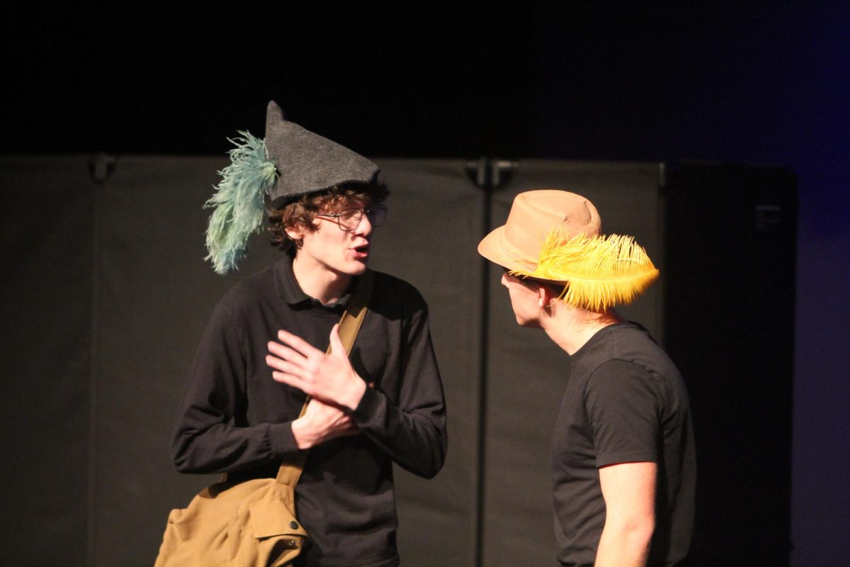 Sam Raymond and Ben Hall act out a scene as the main characters. 