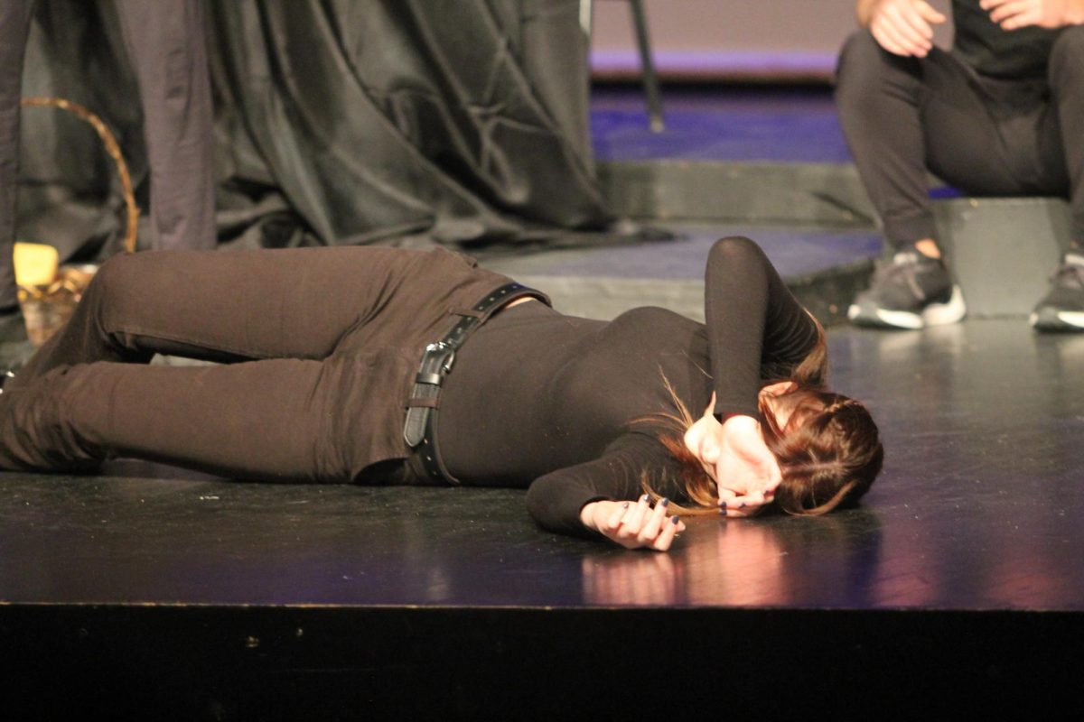 Dawson Huinker play deads after fainting as a giant. 