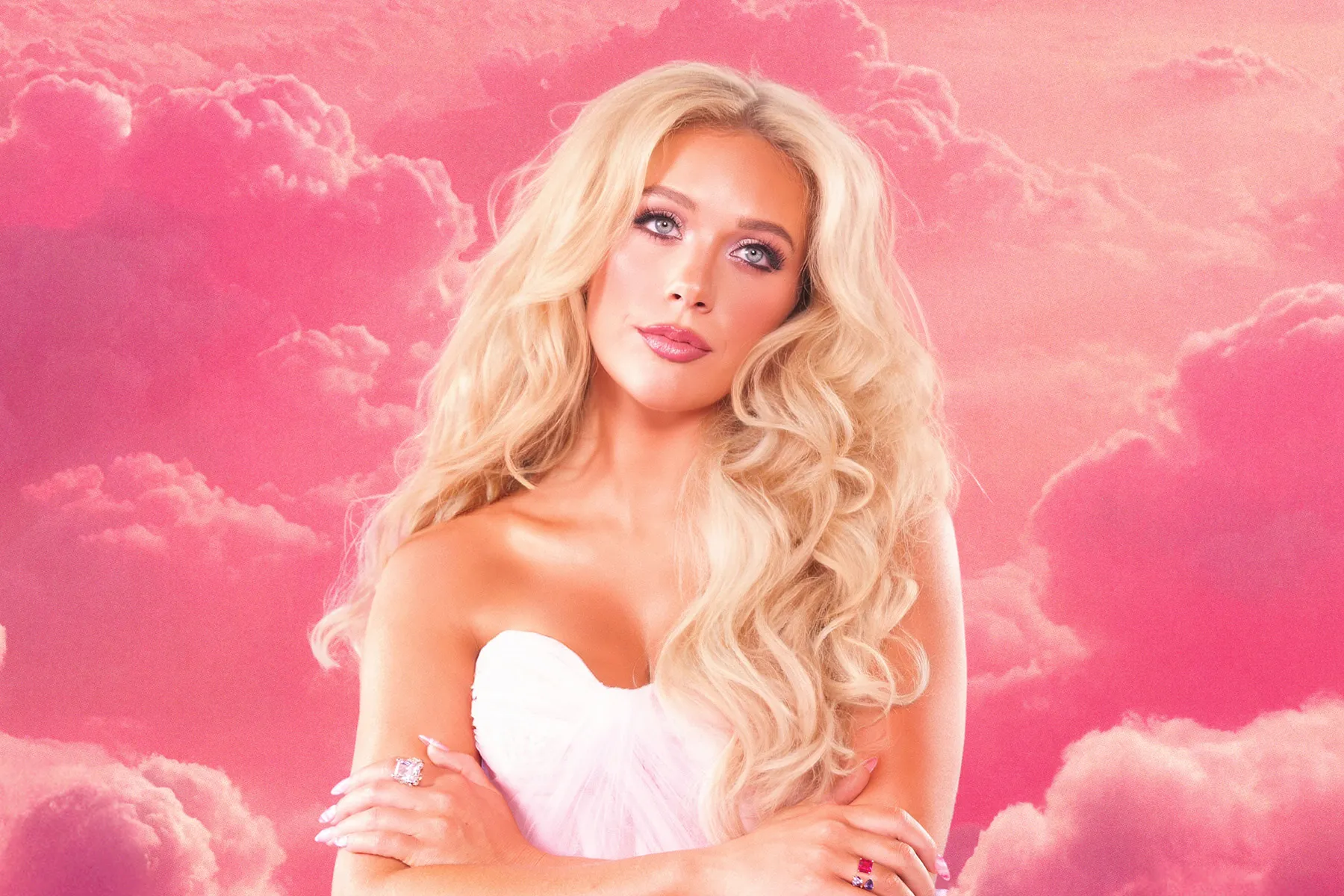 Pretty in pink; Megan Moroney stuns on Cloud 9 with stars in her eyes.